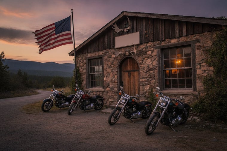 Exterior of a motorcycle chapter meeting location with several bikes parked outside in early evening light